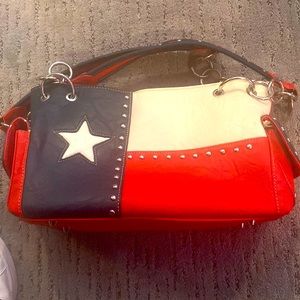 Montana West Texas Flag purse. Never been used. Perfect for the TX rodeo lover.